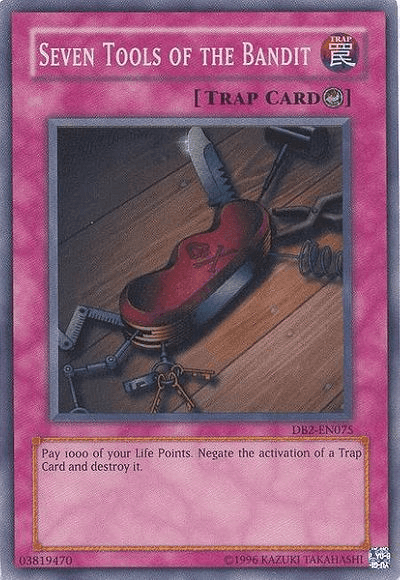 Seven Tools of the Bandit [DB2-EN075] Super Rare (ONLINE ORDER ONLY)
