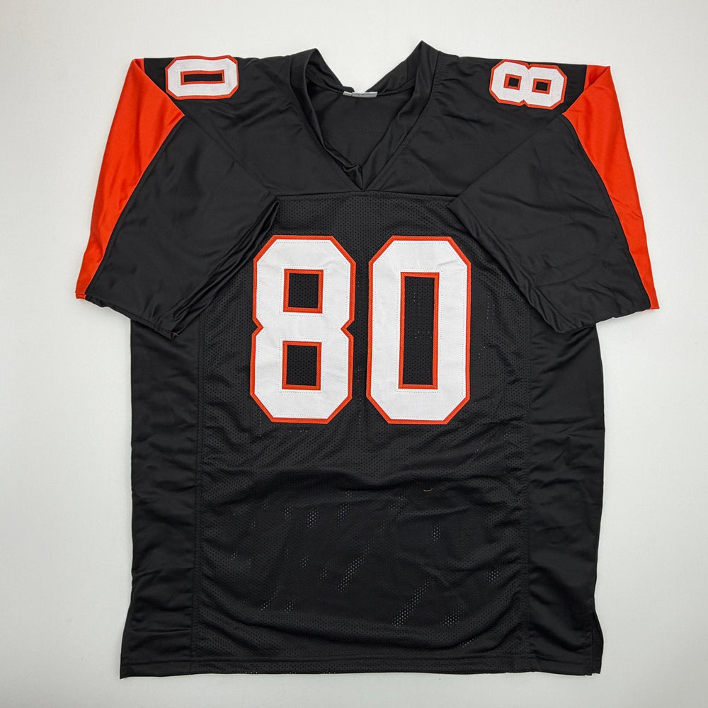 Autographed/Signed Peter Warrick Cincinnati Black Football Jersey Beckett BAS COA