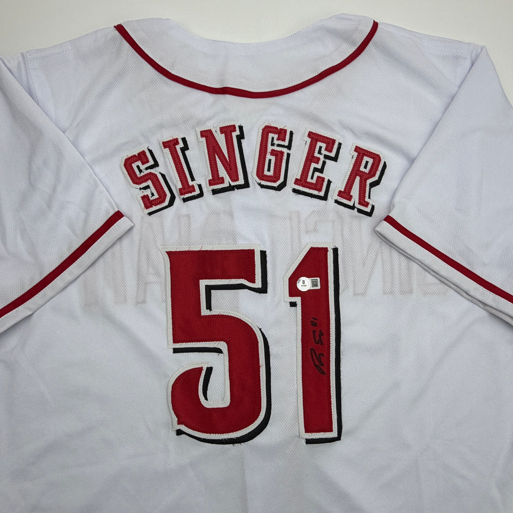 Autographed/Signed Brady Singer Cincinnati White Baseball Jersey Beckett BAS COA