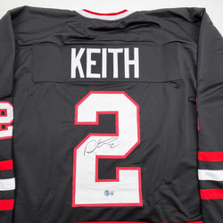 Autographed/Signed Duncan Keith Chicago Black Hockey Jersey Beckett BAS COA