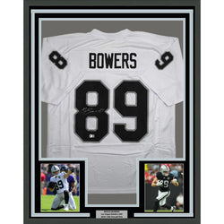 Framed Autographed/Signed Brock Bowers 35x39 Las Vegas Oakland White Football Jersey Beckett BAS COA