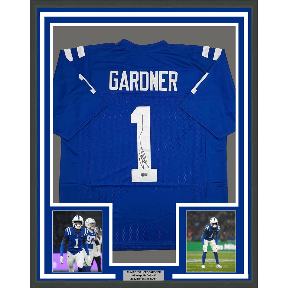 Framed Autographed/Signed Ahmad Sauce Gardner 35x39 Indianapolis Blue Football Jersey Beckett BAS COA