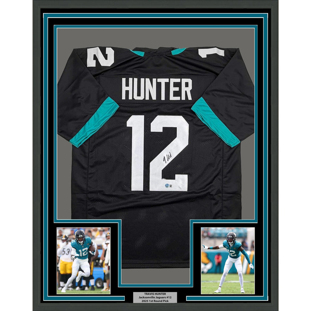 Framed Autographed/Signed Travis Hunter 35x39 Jacksonville Black Football Jersey Beckett BAS COA