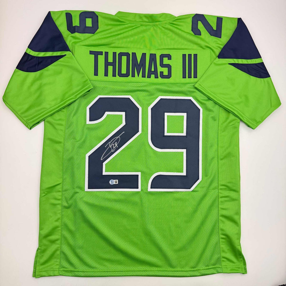 Autographed/Signed Earl Thomas III Seattle Green Football Jersey Beckett BAS COA