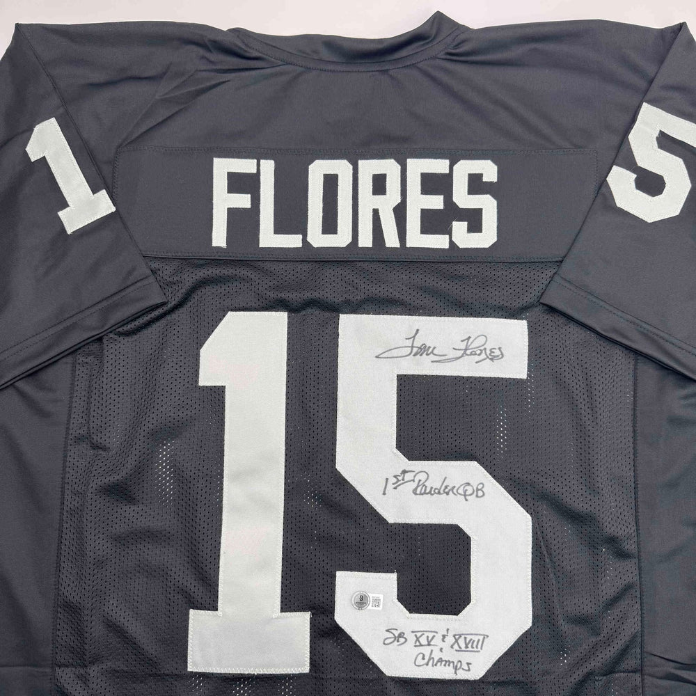 Autographed/Signed Tom Flores Las Vegas Oakland Black Football Jersey Beckett BAS COA