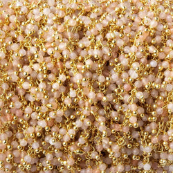 2mm Angel Skin Peach Moonstone micro faceted round Gold Dangling Chain by the foot (ONLINE ORDER ONLY)