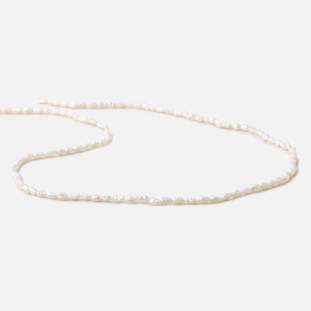 3x2.5-5x2.5mm Off White straight drilled Baroque Rice Freshwater Pearls 16 inch 95 pieces (ONLINE ORDER ONLY)