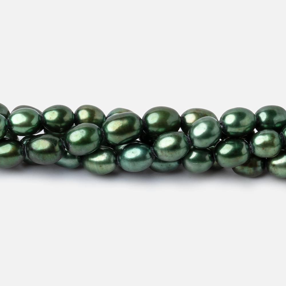 7x5mm Spearmint Green Straight Drilled Oval Pearls 15 inch 63 pieces (ONLINE ORDER ONLY)