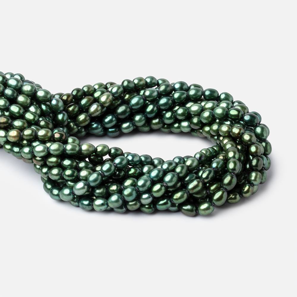 7x5mm Spearmint Green Straight Drilled Oval Pearls 15 inch 63 pieces (ONLINE ORDER ONLY)