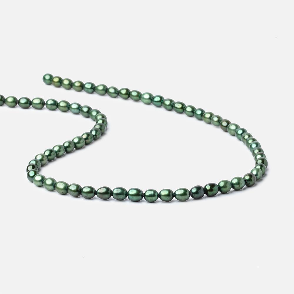 7x5mm Spearmint Green Straight Drilled Oval Pearls 15 inch 63 pieces (ONLINE ORDER ONLY)