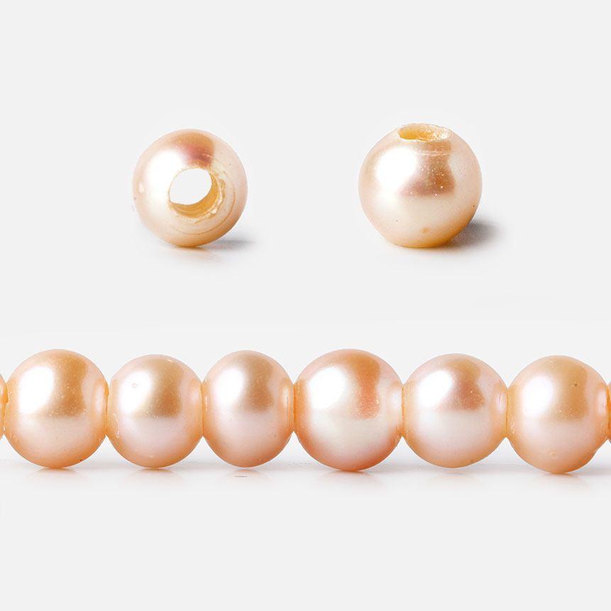 6-7mm Creamsicle Large Hole Off Round Freshwater Pearl 2.5mm drill hole, 15 inch, 75 pieces (ONLINE ORDER ONLY)