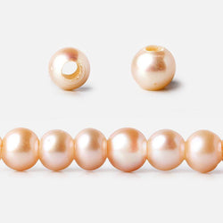 6-7mm Creamsicle Large Hole Off Round Freshwater Pearl 2.5mm drill hole, 15 inch, 75 pieces (ONLINE ORDER ONLY)