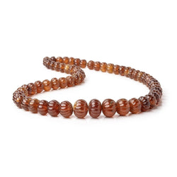 6.5-12.5mm Hessonite Garnet hand carved Melon rondelles 16 inch 60 beads (ONLINE ORDER ONLY)