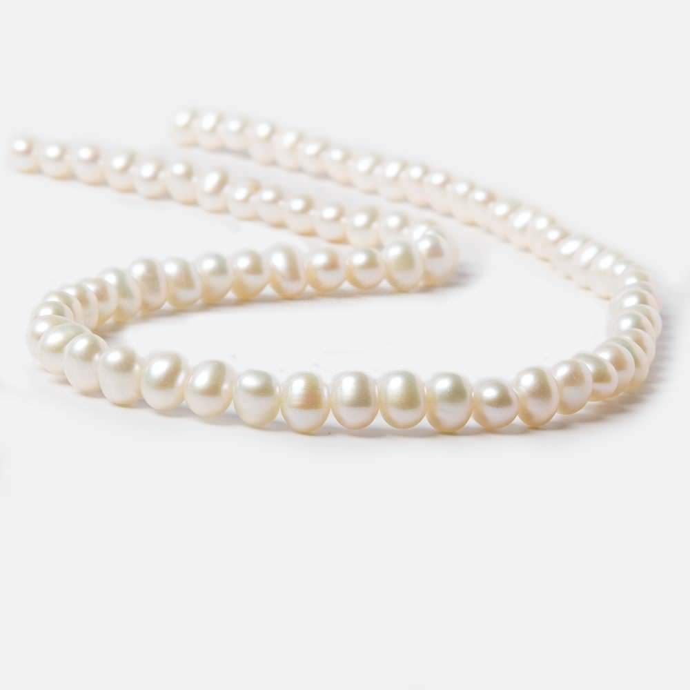 6.5x5-7x5.5mm Cream Side Drilled Oval Freshwater Pearls 16 inch 74 pieces (ONLINE ORDER ONLY)