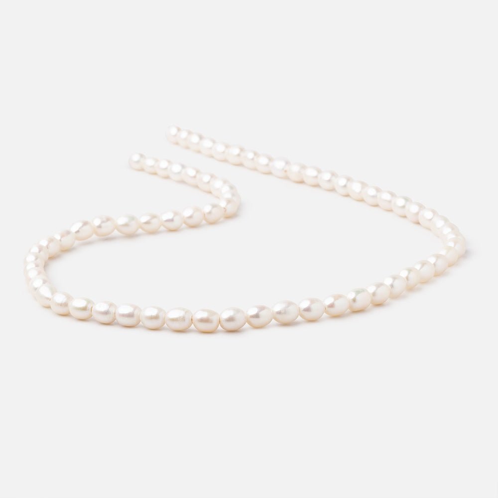 6x4.5mm Off White Oval 1.5mm Drill Hole Freshwater Pearls 61 pieces (ONLINE ORDER ONLY)