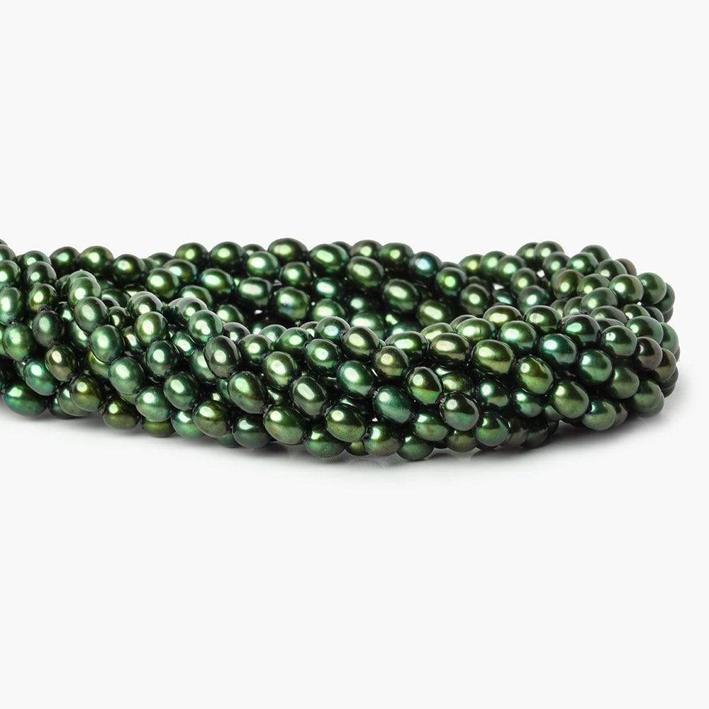 7mm Emerald Green Straight Drilled Oval Pearls, 15 inch, 63 pieces (ONLINE ORDER ONLY)