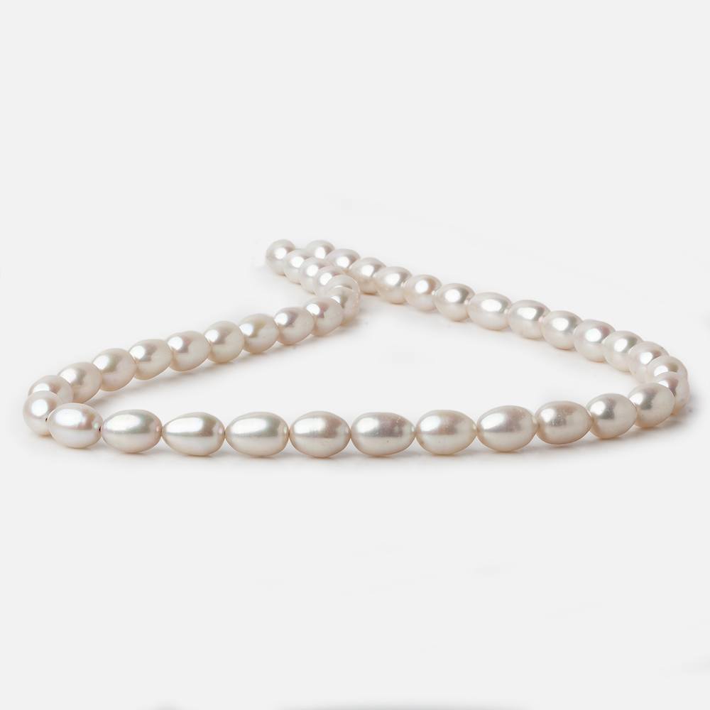 7x9-7x10mm Silver Champagne Straight Drill Oval Freshwater Pearl 16 inch 40 pieces A (ONLINE ORDER ONLY)