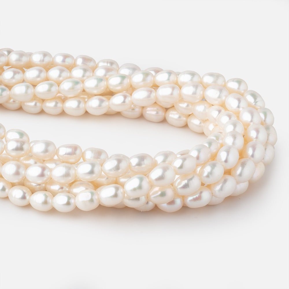 7x9-8x10mm Cream Straight Drilled Oval Freshwater Pearls 15 inch 40 pieces (ONLINE ORDER ONLY)