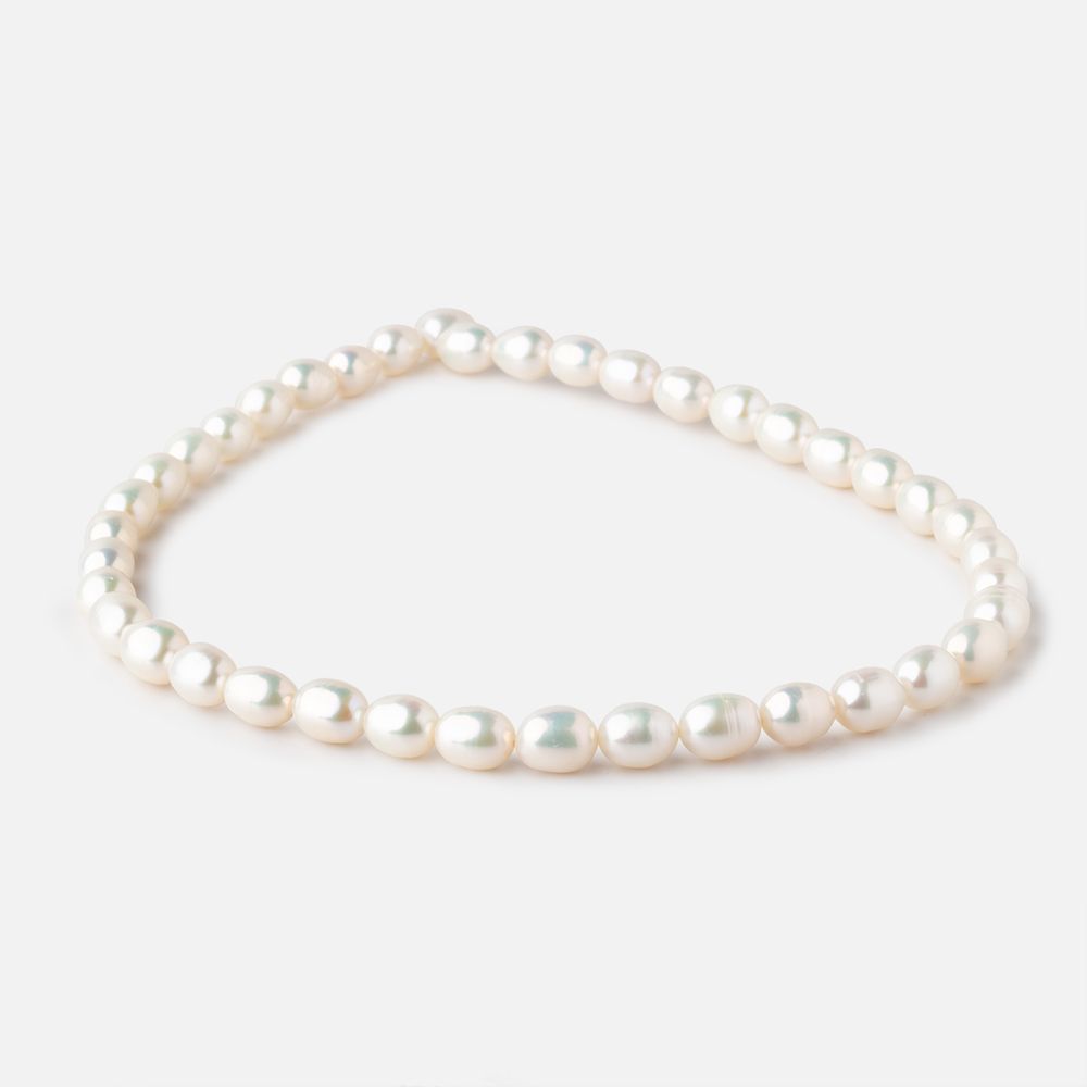 7x9-8x10mm Cream Straight Drilled Oval Freshwater Pearls 15 inch 40 pieces (ONLINE ORDER ONLY)