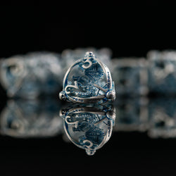 Draco Immortui Hollow Metal Dice Set - Aqua and Silver (ONLINE ORDER ONLY)