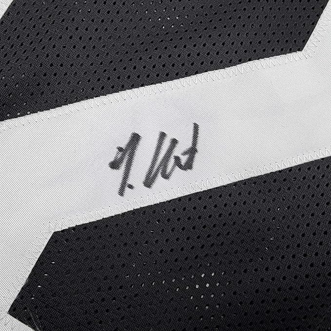 Framed Autographed/Signed Travis Hunter 35x39 Jacksonville Black Football Jersey Beckett BAS COA