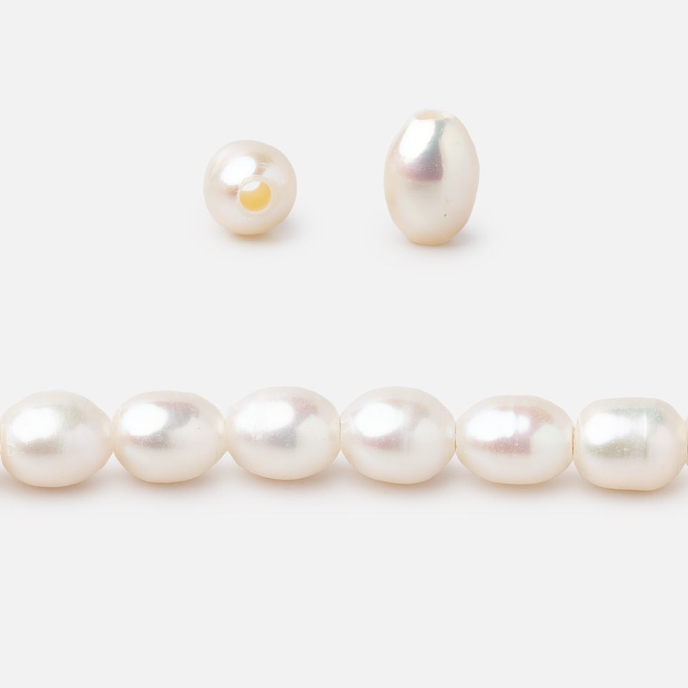 6x4.5mm Off White Oval 1.5mm Drill Hole Freshwater Pearls 61 pieces (ONLINE ORDER ONLY)