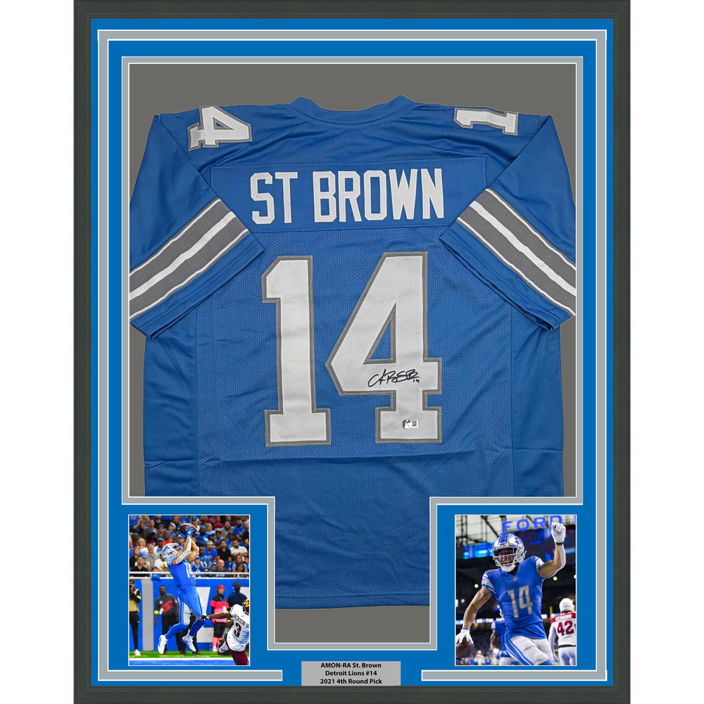 Framed Autographed/Signed Amon-Ra St. Brown 35x39 Detroit Current Blue Football Jersey Beckett BAS COA