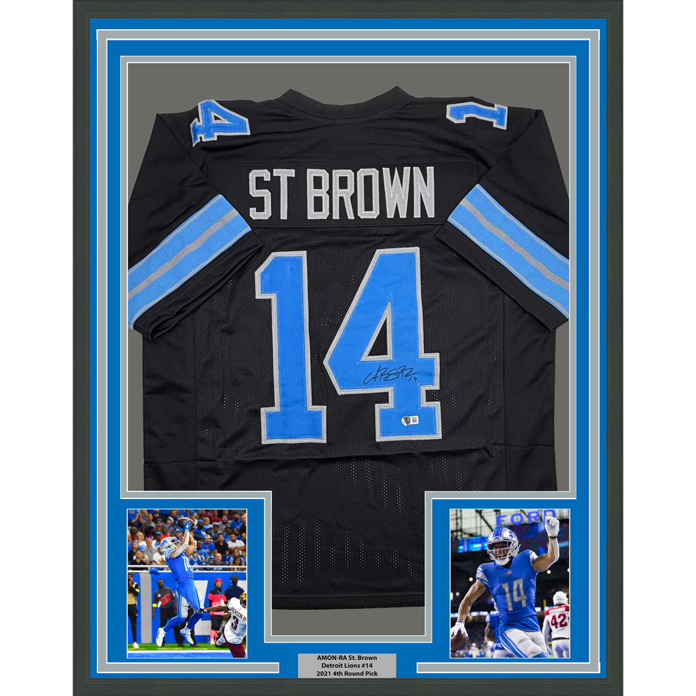 Framed Autographed/Signed Amon-Ra St. Brown 35x39 Detroit Black Football Jersey Beckett BAS COA