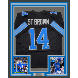 Framed Autographed/Signed Amon-Ra St. Brown 35x39 Detroit Black Football Jersey Beckett BAS COA