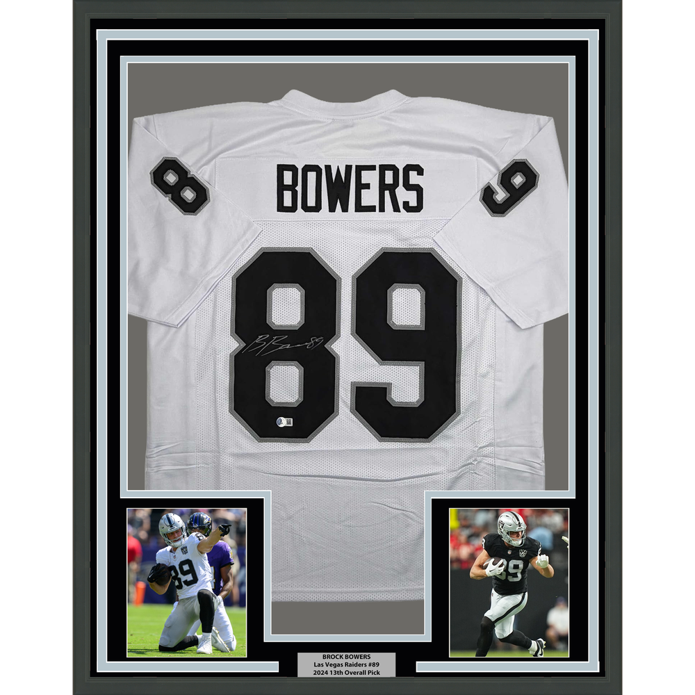 Framed Autographed/Signed Brock Bowers 35x39 Las Vegas Oakland White Football Jersey Beckett BAS COA