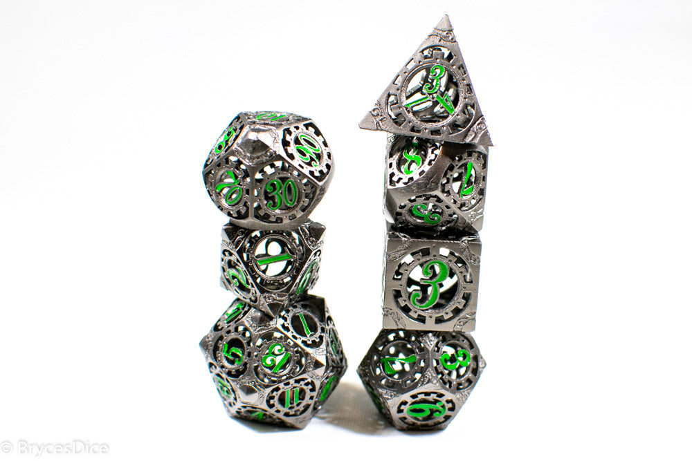 Gun Metal Hollow Gear Dice with Green Numbers 7-Dice Set (Online Only)