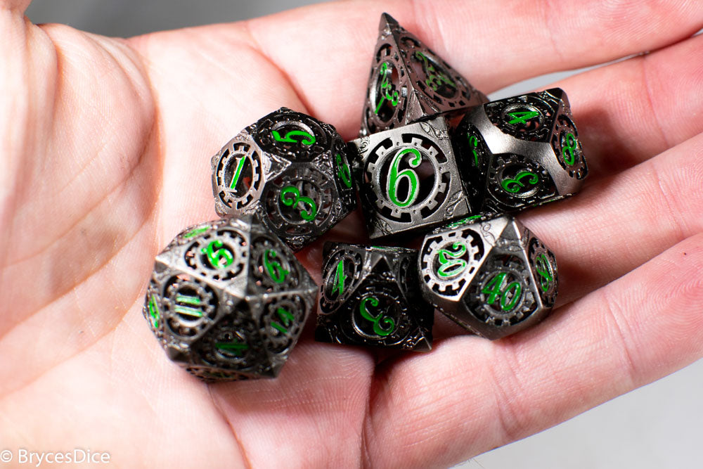 Gun Metal Hollow Gear Dice with Green Numbers 7-Dice Set (Online Only)