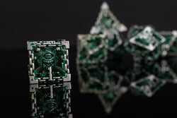 Beholder's Gates Hollow Metal Dice Set - Green and Silver (ONLINE ORDER ONLY)