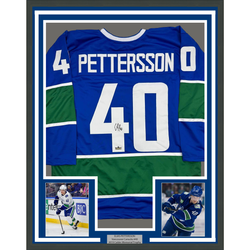 Framed Facsimile Autographed Elias Pettersson 35x39 Vancouver Blue Reprint Laser Auto Hockey Jersey (ONLINE ORDER ONLY)