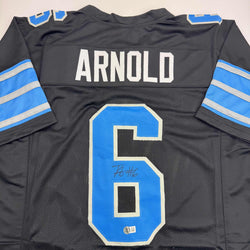 Autographed/Signed Terrion Arnold Detroit Black Football Jersey Beckett BAS COA