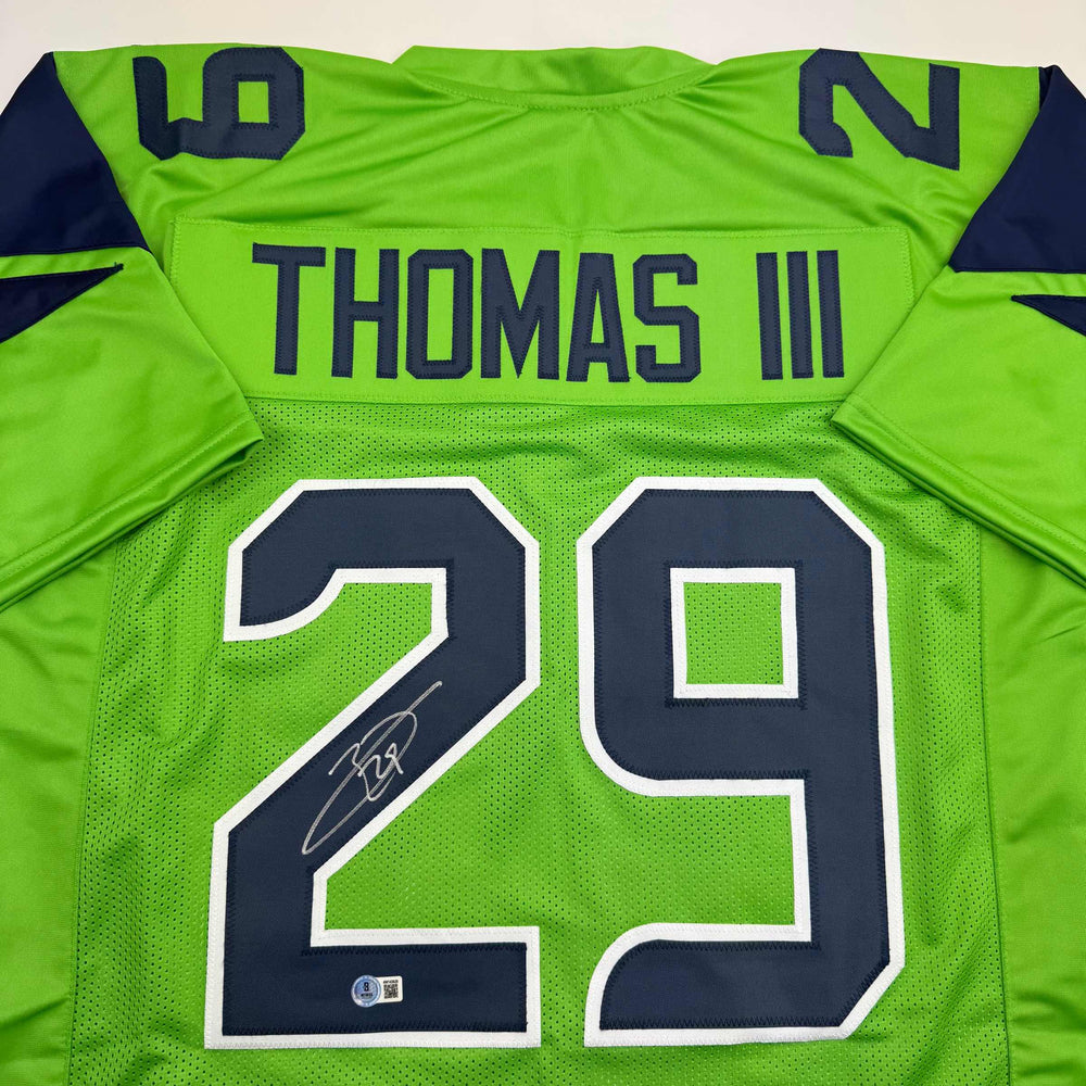 Autographed/Signed Earl Thomas III Seattle Green Football Jersey Beckett BAS COA