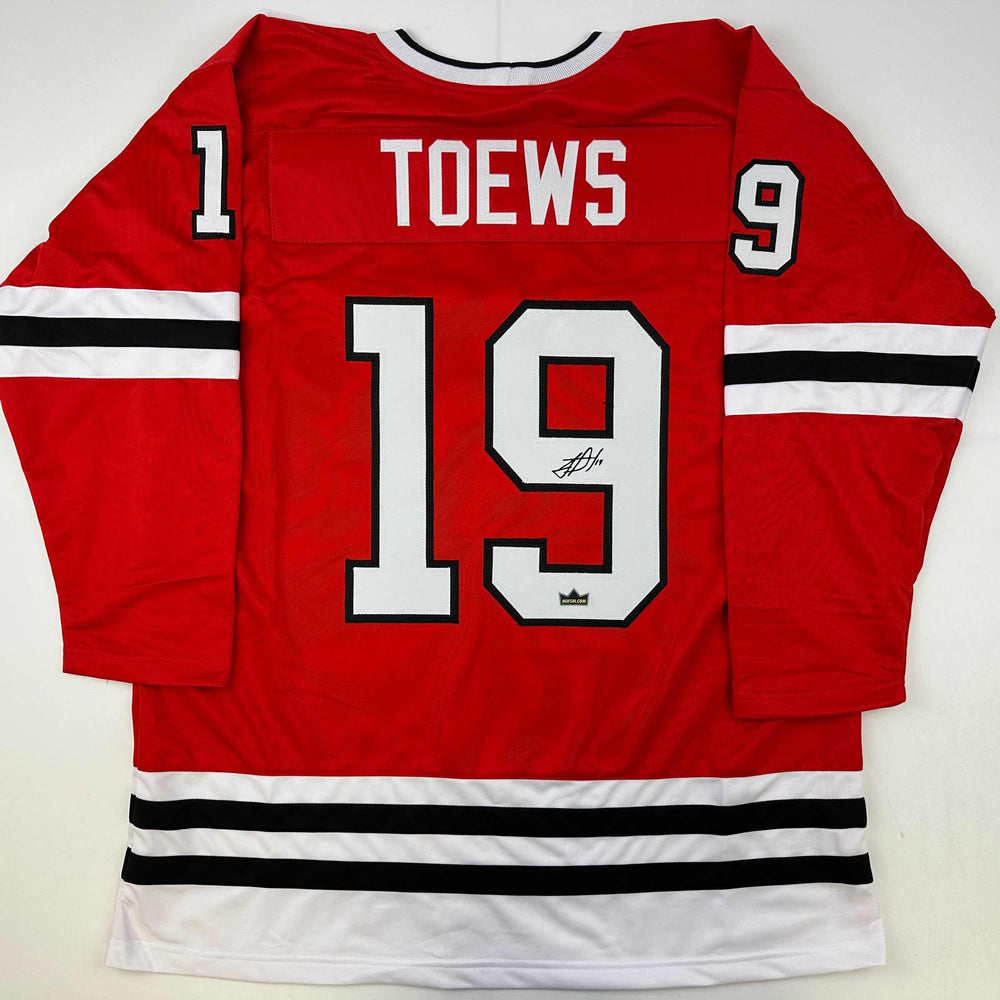 Facsimile Autographed Jonathan Toews Chicago Red Reprint Laser Auto Hockey Jersey Size Men's XL (ONLINE ORDER ONLY)