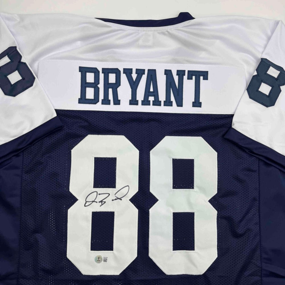 Autographed/Signed Dez Bryant Dallas Thanksgiving Day Football Jersey Beckett BAS COA