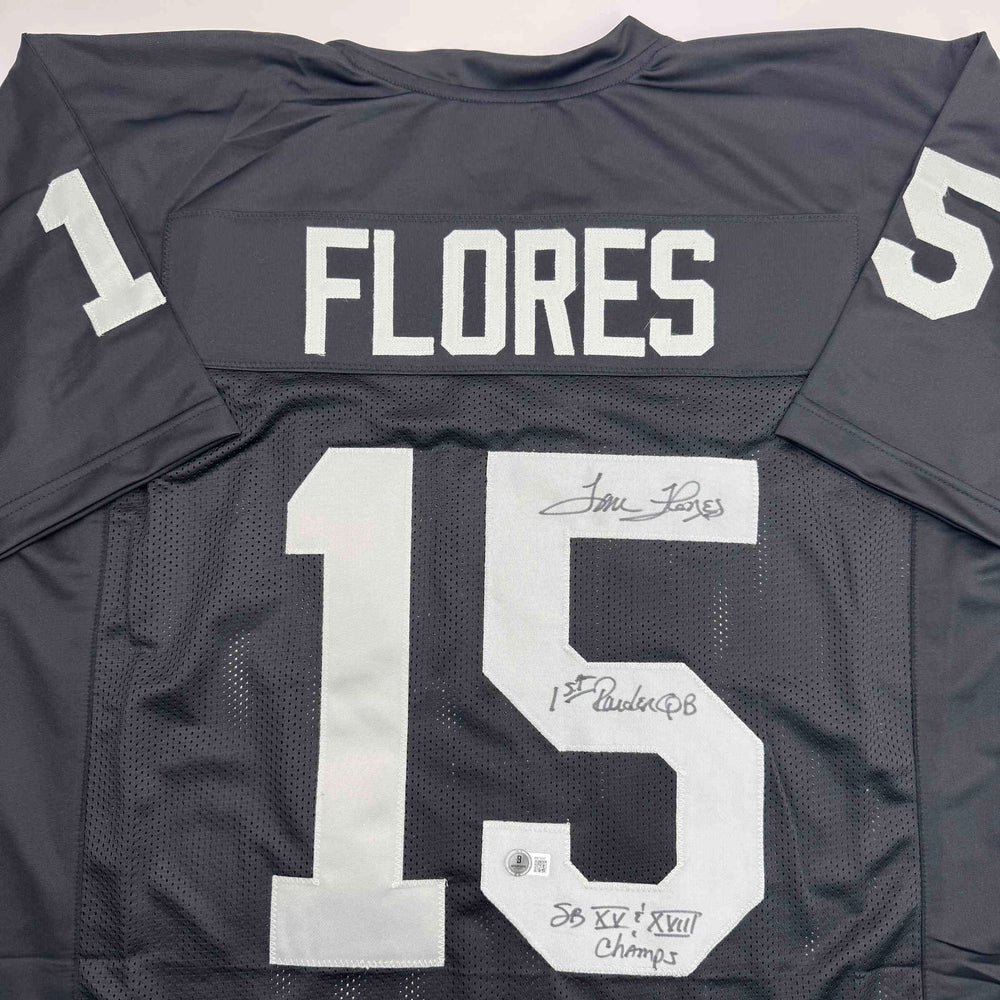 Autographed/Signed Tom Flores Las Vegas Oakland Black Football Jersey Beckett BAS COA