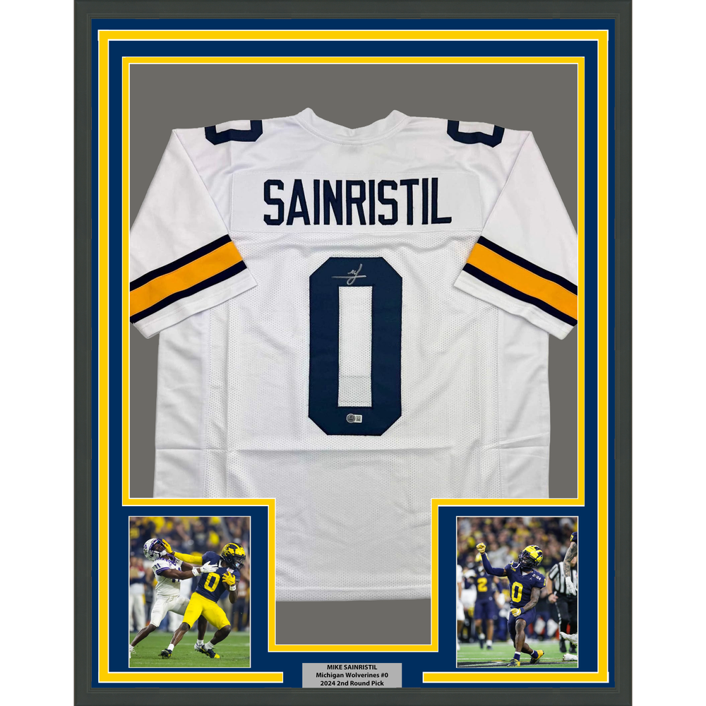 Framed Autographed/Signed Mike Sainristil 35x39 Michigan White College Football Jersey Beckett BAS COA