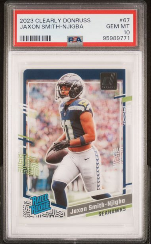 Graded 2023 Panini Clearly Donruss Jaxon Smith-Njigba #67 Rookie RC Football Card PSA 10 Gem Mint
