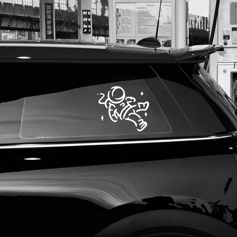 THE  falling Cute little spaceman stickers .Add a Touch of Space Magic to Your Car with Stylish Car Accessories. (ONLINE ORDER ONLY)