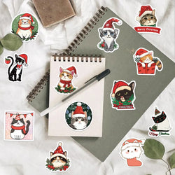 50pcs Cute Christmas Cat Graffiti Stickers Aesthetic DIY Luggage Bike Phone New Year Gift Decoration Sticker Toy (ONLINE ORDER ONLY)
