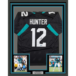 Framed Autographed/Signed Travis Hunter 35x39 Jacksonville Black Football Jersey Beckett BAS COA
