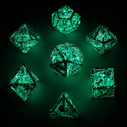 Skull's Grin Hollow Metal Dice Set - Glow in the Dark Blue