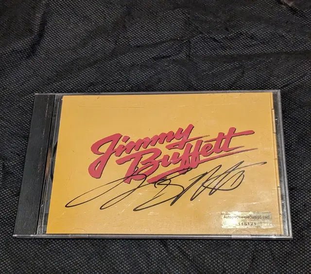 Jimmy Buffett autographed disc CD with coa 115121 (Online Order Only)